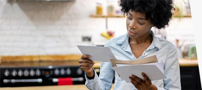 Local small business owner preparing to send mail.